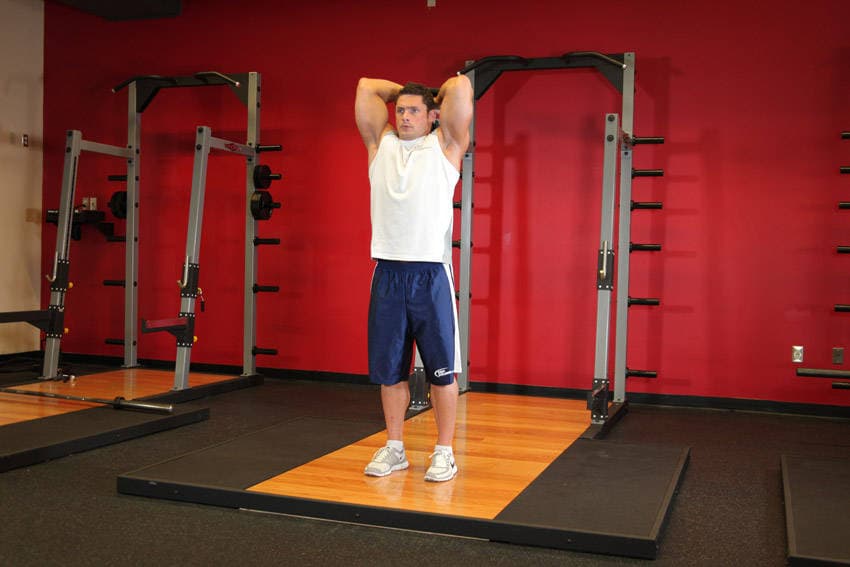 Dumbbell triceps extension: Bottom