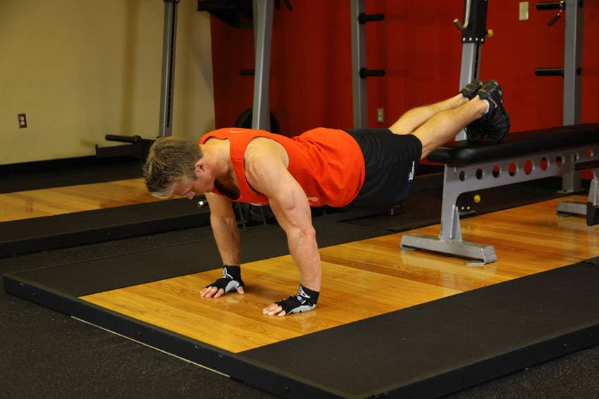 Feet-elevated push-ups: Top