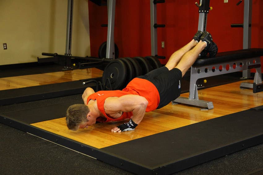 Feet-elevated push-ups: Bottom